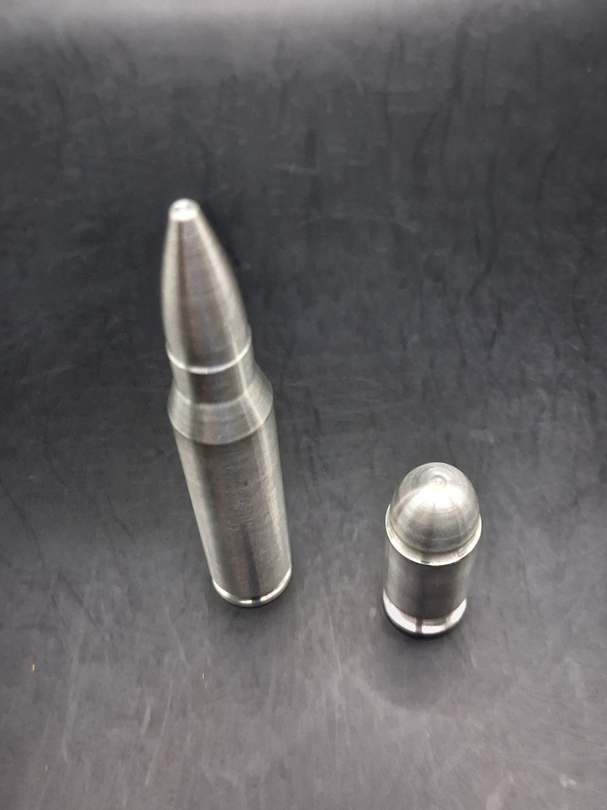 Lot of 2 Silver Bullet Bullion .999 Fine .308/.556 2oz + .45 Auto ACP 3oz Total